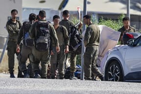 IDF soldiers outside Sde Teiman base