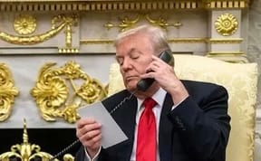 President Donald Trump on the phone