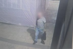 The suspect under arrest
