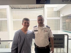 Yair Frankenthal with volunteer coordinator for the region, Lior Fadida