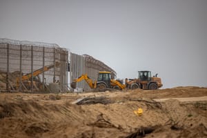Tractors working on the border fence between Israel and the Gaza Strip, on December 28, 2023.