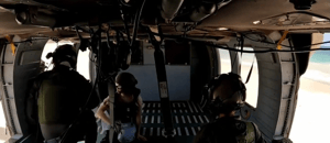 Hostage Noa Argamani (in jeans) getting on the helicopter taking her home.