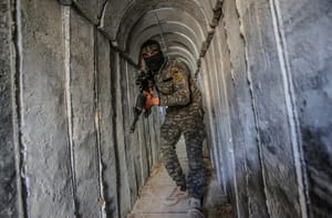 A Palestinian fighter of the Al-Quds brigades, the military wing of Palestinian Islamic Jihad (PIJ), seen inside a military tunnel in Beit Hanun, in the Gaza Strip.