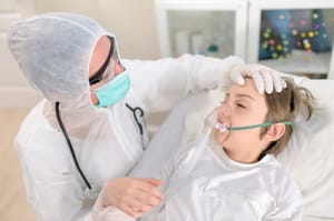 Doctor treats a child