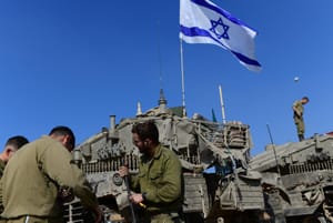 IDF forces at a staging area in southern Israel near the border with Gaza