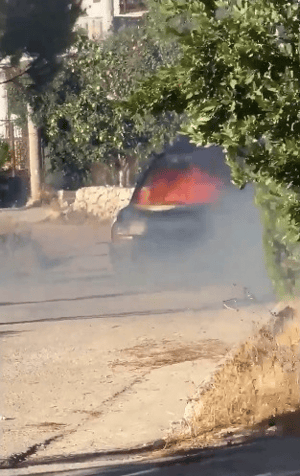 Car destroyed in walkie talkie explosion.