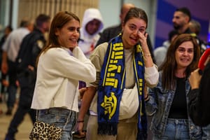 Maccabi Tel Aviv fans who flew on El Al rescue flight from Amsterdam arrive at Ben Gurion international airport, near Tel Aviv, November 8, 2024.