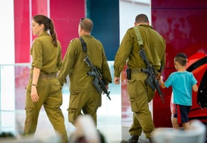 Israeli soldiers seen walking in a mall in the Southern Israeli town of Beer Sheva