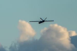 A drone fired from Lebanon into Israel flies over the Israeli border with Lebanon