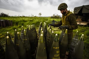 A soldier prepares 155m shells for firing during IDF military training in the Golan Heights 