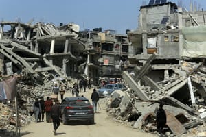 Palestinians live among the rubble of their homes which were destroyed in the war between Israel and Hamas, in the city of Khan Yunis, southern Gaza Strip