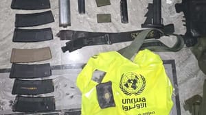 The arms and the UNRWA vest found by the IDF