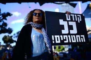 Israelis at the protest tent set up by families of Israelis held kidnapped by Hamas terrorists in Gaza, outside Hakirya Base in Tel Aviv, March 13, 2025.