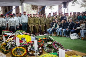 Family and friends of Israeli soldier attend the funeral of Sergeant first class Yona Betzalel Brief at Mount Herzl Military Cemetery in Jerusalem on November 27, 2024. 