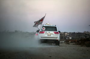 International Red Cross (ICRC) vehicles drive in Deir el-Balah, as they transports US-Israeli hostage Edan Alexander after being released from Hamas captivity on May 12, 2025.