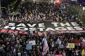 Demonstrators protest against the Israeli government and for the release of Israelis held hostage in the Gaza Strip outside Hakirya Base in Tel Aviv, May 24, 2025. 