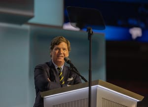 Tucker Carlson addresses the 2024 Republican National Convention at the Fiserv Forum.