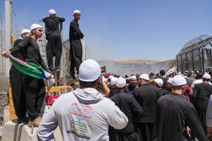 Druze residents protest near the Israeli-Syrian border fence in solidarity with their community in Syria, in Majdal Shams, July 16, 2025. 