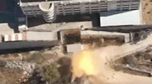 Blowing up bombs.