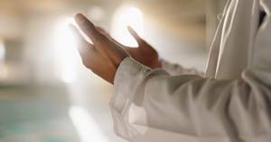  person and hands in mosque for prayer