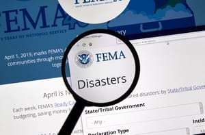 Fema.gov : USA Government home page under magnifying glass.