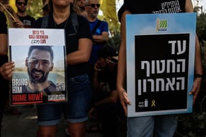Israelis protest for the release of the Israeli hostages held by Hamas in Gaza in Kibbutz Beeri, in southern Israel, August 17, 2025. 
