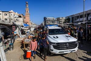 UN trucks preparing to bring in aid.