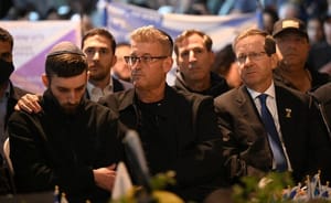 Former hostage Matan Angrest at the funeral