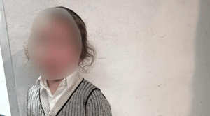 The boy who was found alone in Qalandiya.