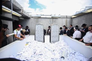NEW YORK CITY - JUNE 21 2015: followers of the late Lubavitcher Grand Rebbe Menachem Mendel Schneerson gathered at Old Montefiore Cemetery to celebrate the 21st Yahrzeit or anniversary of his passing.