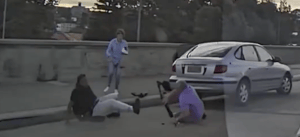 Boris and Sofia Gurman attempting to stop terrorist Sajid Akram as he emerges to begin shooting.