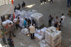 Humanitarian aid is distributed to Palestinians in the northern Gaza Strip, June 26, 2025.