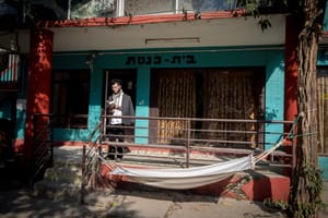 An orthodox Jewish man prays outside the 'Beit Chabad' house in Kathmandu, Nepal. December 18, 2016.