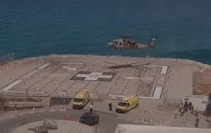 Helicopter transports 2 wounded soldiers