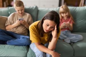 Kids at home, stressed parent