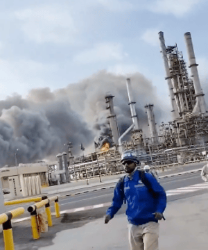 WORKERS EVACUATE AS SAUDI ARAMCO REPORTEDLY BURNING AFTER IRANIAN BALLISTIC MISSILE STRIKE