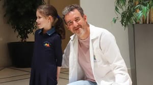 The girl, now recovered, with Dr. Michael Gorvitz