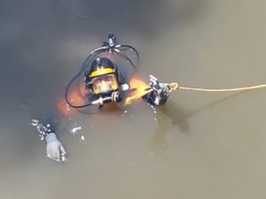 ZAKA diver find missing phones in Yarkon river