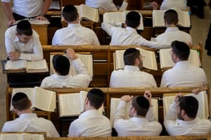 Yeshiva students learn in Hebron yeshiva