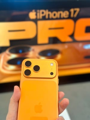 A close-up view of the newly released Apple iPhone 17 Pro Max in Cosmic Orange color, Apple unveiled its latest flagship smartphone.