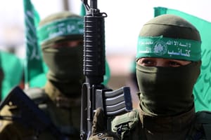 Hamas terrorists  take part in an anti-Israel military show in the southern Gaza Strip,