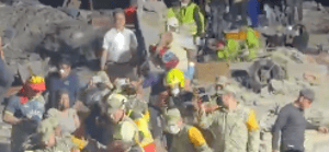 The Seven-Nation Miracle: Rescuers Free Security Guard After Eight Days Trapped Beneath Rubble