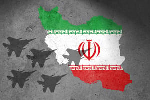 Flag of Iran painted on a concrete wall with airplane shadows