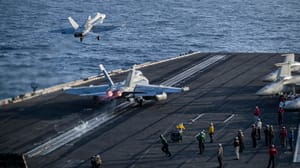 Fighter jets take off from the USS Lincoln