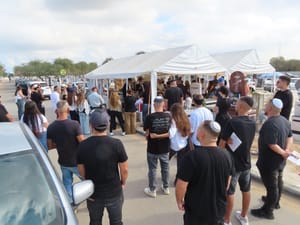 Bereaved families at the Ashdod cemetery