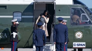 VP's wife stumbles on Marine Two steps with baby strapped to her chest