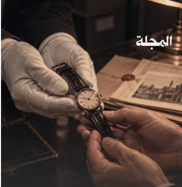 The Syrian intelligence officer displays the watch