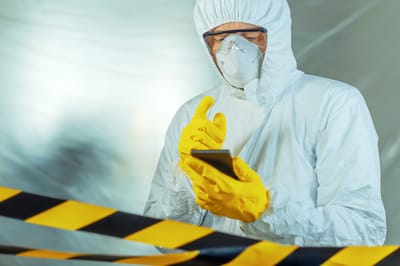 Epidemiologist using smartphone in hospital virus infection quarantine