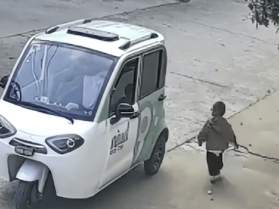 Child Climbs into Running Car and Drives Toward Busy Road as Mother Watches