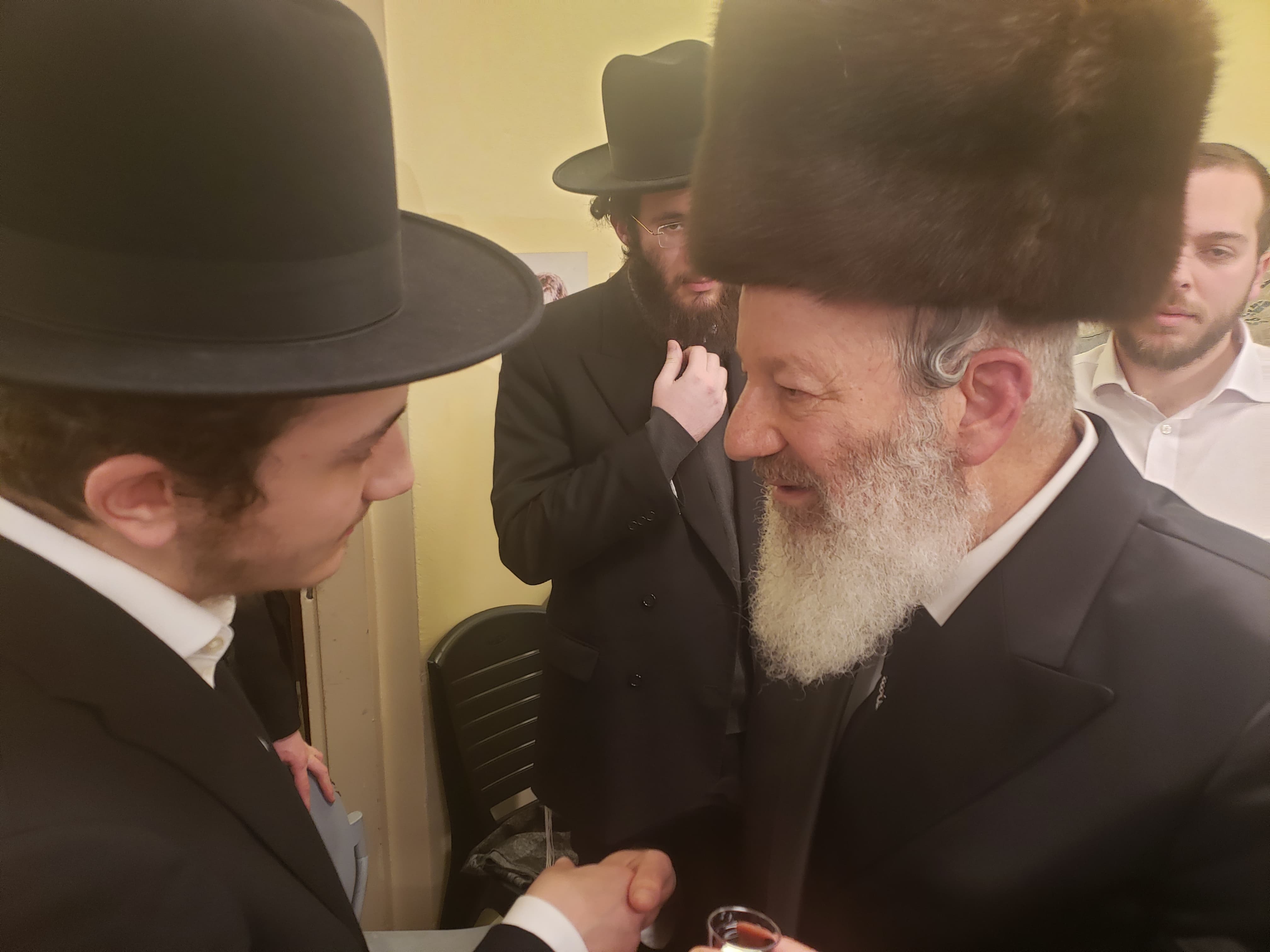 The Admor of Pashkan at the Tish Celebrating the Hilula of the Magid, of Blessed Memory